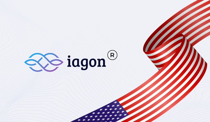 A white background displays the 'iagon' logo with a registered trademark symbol and a blue-purple infinity-style icon, with an American flag ribbon flowing across the right side of the image.
