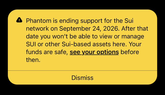 A yellow warning banner from Phantom wallet announces that support for the Sui network will end on September 24, 2026, after which users cannot view or manage SUI or other Sui-based assets. The notice appears to reinforce the post's criticism that Phantom's Sui integration was incomplete, lending credibility to the call for @SlushWallet to step up as a better alternative.