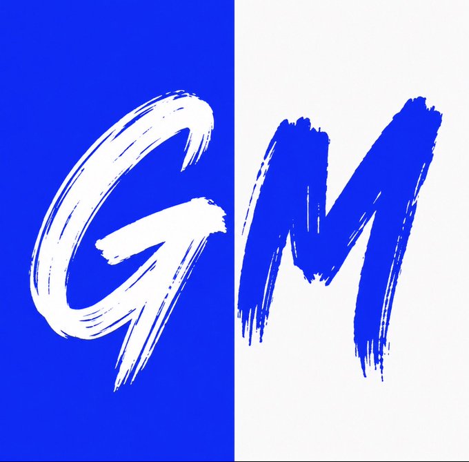 A graphic featuring the letters 'GM' rendered in a rough, brushstroke style, with a white 'G' on a blue background and a blue 'M' on a white background.
