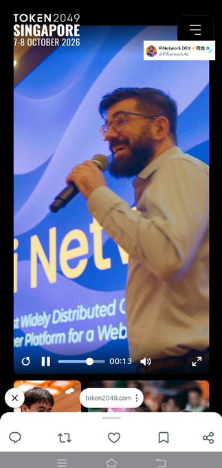 The screenshot shows a promotional video for TOKEN2049 Singapore (7-8 October 2026) featuring a bearded man with glasses speaking into a microphone on stage, with the Pi Network logo visible in the corner. A banner partially reads "Widely Distributed" and "Platform for a Web." The video clip supports the post's point about promotional footage reuse, as it shows what appears to be archival footage of a speaker rather than content directly produced for the TOKEN2049 event.