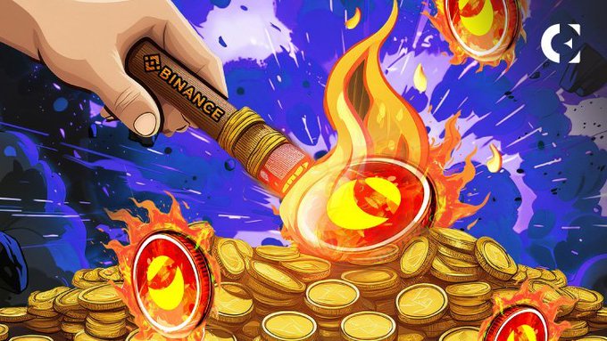 A hand holding a Binance-branded torch ignites a pile of gold coins and red LUNC tokens, visually representing the burning of Terra Luna Classic tokens as promoted in the post.