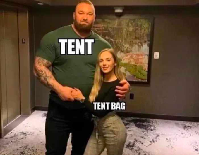 A large bearded man labeled 'TENT' stands behind a petite woman labeled 'TENT BAG' in a meme image showing their dramatic size difference.