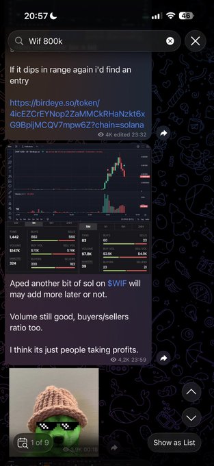 iphone screen displays a stock trading app, with a green icon and a message about a new entry range.