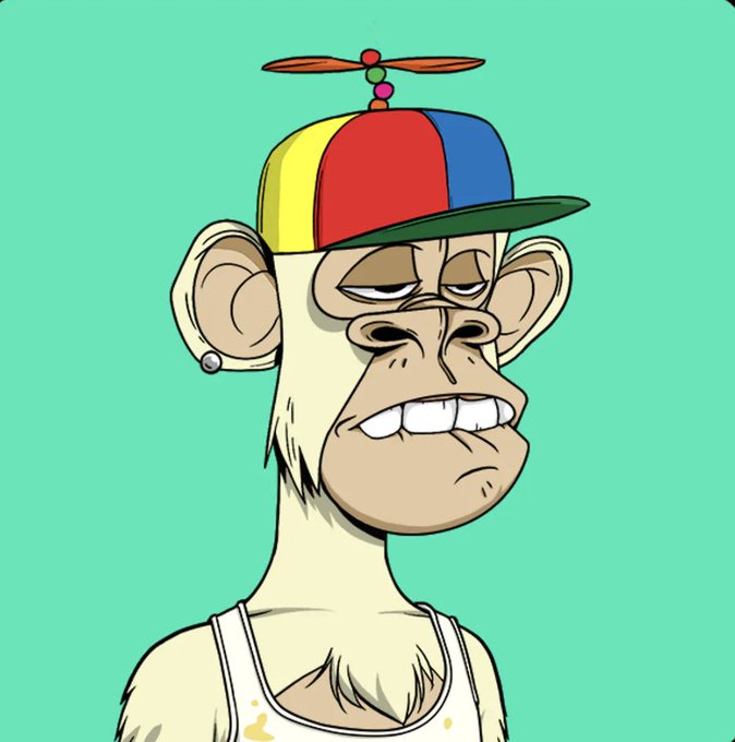 The image features a cartoon monkey wearing a colorful hat with a propeller on top of it. The monkey has a white tank top on and appears to be looking off into the distance, possibly daydreaming or lost in thought. The background is a light blue color that complements the monkey's attire. The caption at the bottom of the image reads: "Ok I simply can'T go without a BAYC for too long, so meet my placeholder while I hunt for my forever ape".