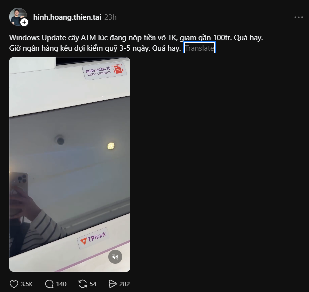 A social media post from "hinh.hoang.thien.tai" featuring Vietnamese text complaining that a TPBank ATM was deducting money for a Windows Update, accompanied by a photo of an ATM screen reflecting the user.