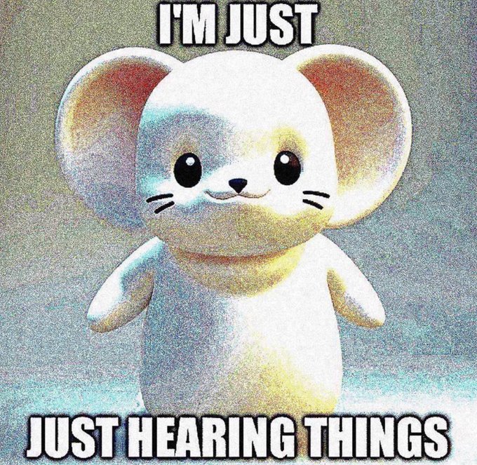 A meme image of a cute, smiling white cartoon animal with large round ears, featuring the text 'I'M JUST' at the top and 'JUST HEARING THINGS' at the bottom.
