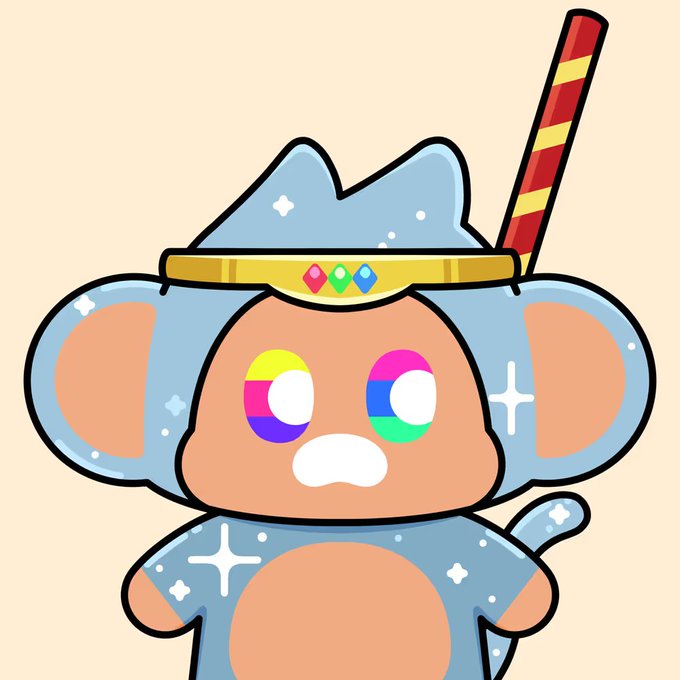 A cute cartoon character resembling a monkey wearing a blue wizard hat with jewels, featuring colorful rainbow eyes.
