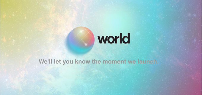 The image features a cosmic, pastel-colored background with a faceted rainbow sphere logo next to the word "world," accompanied by the text "We'll let you know the moment we launch," serving as a pre-launch teaser graphic for the World (world_xyz) project.