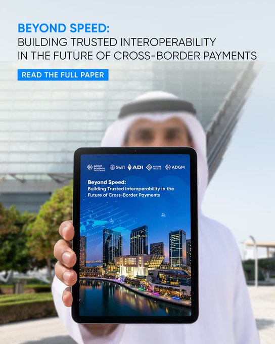 The image shows a person in traditional Middle Eastern attire holding up a tablet displaying the cover of a white paper titled "Beyond Speed: Building Trusted Interoperability in the Future of Cross-Border Payments," featuring logos of Global Finance (Abu Dhabi), Swift, ADI, Future Payments, and ADGM. The same title appears as a header on the image with a "READ THE FULL PAPER" call-to-action button, visually promoting the Swift and ADGM collaborative report referenced in the post.