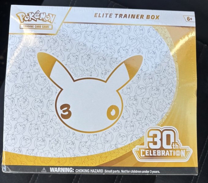 A sealed Pokémon Trading Card Game Elite Trainer Box featuring a 30th Celebration design with a stylized Pikachu face and a '30' logo.
