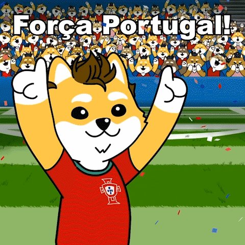 llorca Portugal's mascot, a Shiba Inu dog, waves with arms raised and thumbs up while wearing a red shirt with the word "Portugal" on it.