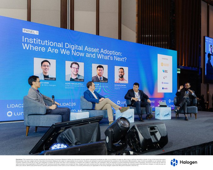 A panel of four men participates in 'Institutional Digital Asset Adoption: Where Are We Now, and What's Next?' at a conference, with panelists including Ed Haber (Co-Coin Holdings) and Alexis Riuvalcioca (Chief Commercial Officer, Block.one).