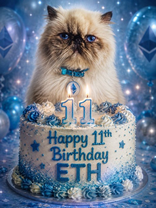 This image depicts a cat celebrating Ethereum's 11th birthday with a decorated cake featuring the inscription "Happy 11th Birthday ETH" and balloons adorned with the Ethereum logo. The cat's collar also displays the Ethereum symbol, linking it directly to the post's message.