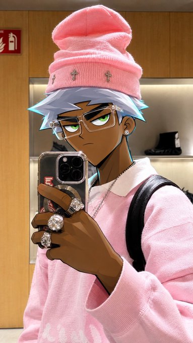 An anime-style character with spiky white hair, green eyes, and a pink beanie takes a mirror selfie with a phone, wearing a pink sweater, glasses, and silver rings.