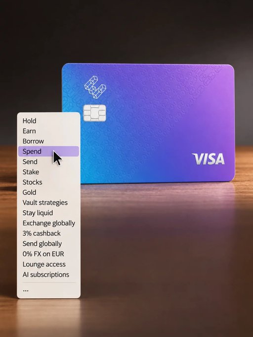 A blue-purple Visa card with a chip sits behind an open spending menu highlighting “Spend” in purple. The menu lists “Hold,” “Earn,” “Borrow,” “Spend,” “Send,” “Stake,” “Stocks,” “Gold,” “Vault strategies,” “Stay liquid,” “Exchange globally,” “3% cashback,” “Send globally,” “0% FX on EUR,” “Lounge access,” and “AI subscriptions,” visually illustrating the post’s joke that the company “ran out of menu” by adding financial options.