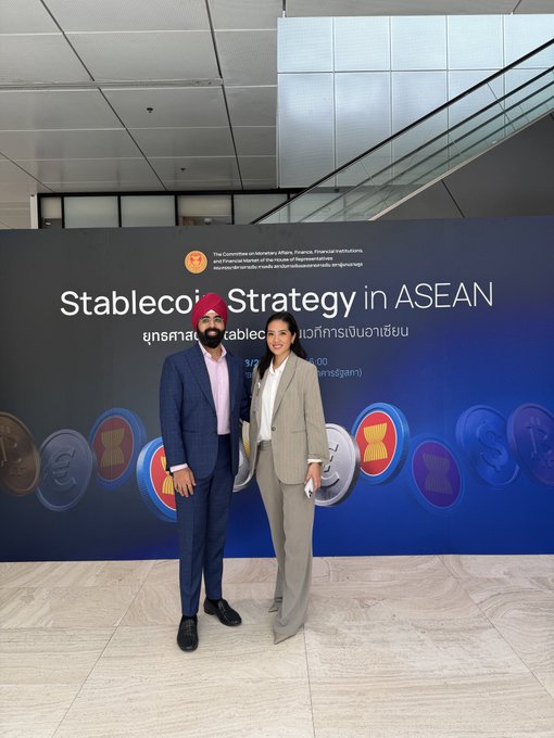 A man in a dark blue suit and red turban stands alongside a woman in a beige blazer in front of a banner reading "Stablecoin Strategy in ASEAN," hosted by the SEC Thailand. The image visually supports the post's caption by highlighting Thailand's legislative engagement with cryptocurrency and stablecoin policy development.