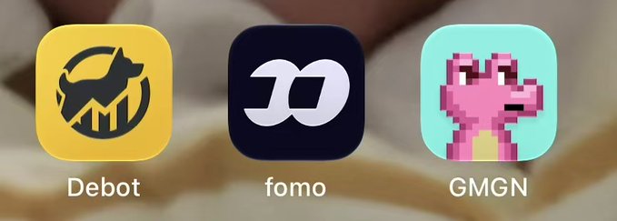 Three mobile app icons displayed: Debot (yellow with bull logo), fomo (black with infinity-style logo), and GMGN (teal with pixel dinosaur).