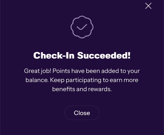 A mobile app screen displaying a 'Check-In Succeeded!' confirmation message, indicating that points have been added to the user's balance.