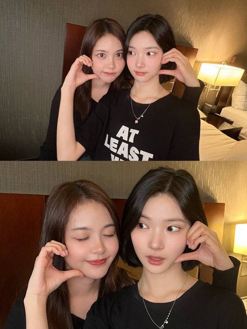 Two young women pose closely together in what appears to be a hotel room, both making hand gestures near their faces in both frames—one wearing a black shirt with partial text "AT LEAST" visible. The cozy selfie-style photos don't appear to have any direct visual connection to COWZ (a financial ticker symbol), suggesting the post may be using the image metaphorically or the connection is more personal than literal.
