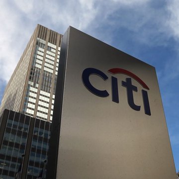 The image shows the Citi logo on a tall corporate building against a blue sky, representing Citibank, the financial institution referenced as forecasting an optimistic $189,000 Bitcoin price target by 2026.