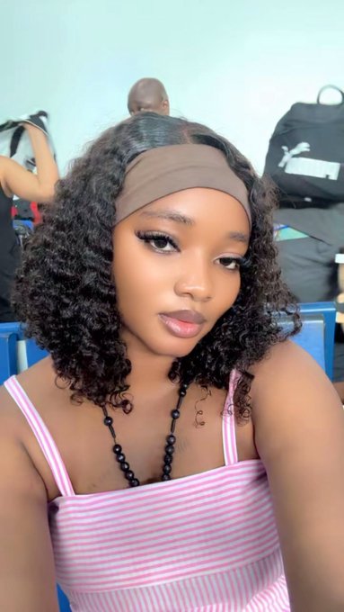 A stylish young woman with curly hair, a tan headband, and a pink striped top takes a selfie in what appears to be a public space. The image serves as a personal introduction for Melissa, a Revenue Growth Strategist and Web3 Marketer, showcasing her as a confident content creator open to various professional partnerships and collaborations.