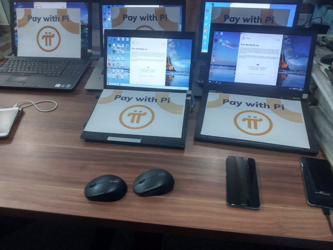 A display of multiple laptops and smartphones showcases the "Pay with Pi" interface, featuring the Pi cryptocurrency logo prominently. The image reflects nostalgic optimism about Pi Network's earlier real-world utility, envisioning a larger-scale resurgence of Pi-based payments.