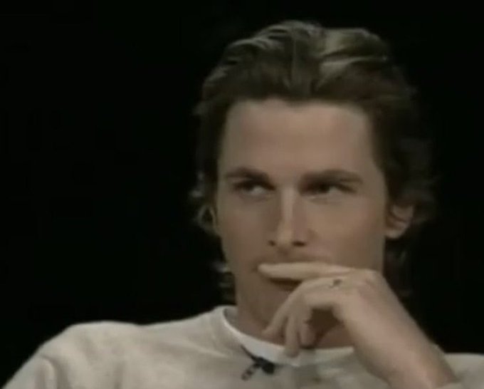 A young man with curly hair and a contemplative expression rests his hand near his mouth, appearing thoughtful or skeptical. His pensive demeanor complements the post's message about investors repeatedly entering crypto bull markets without gaining meaningful exposure, suggesting a subtle judgment of the recurring cycle.