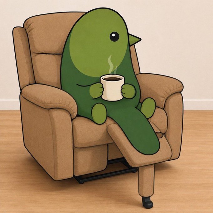 A cartoon illustration of a green bird-like character relaxing in a tan recliner chair while holding a steaming mug of coffee.