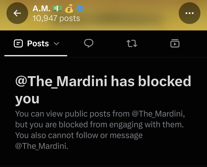 A Threads profile page for user "A.M." (with money bag and verification emojis) showing 10,947 posts displays a blocked-by notice stating "@The_Mardini has blocked you," explaining that the viewer can still see public posts but cannot engage, follow, or message that account. The accompanying caption "الراكع الثامن" (The Eighth Kneeler) appears to sarcastically frame being blocked as another submission or yielding moment in a series of similar interactions.