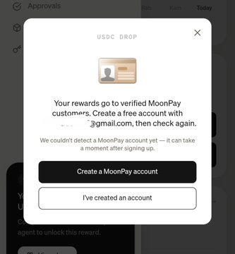Modal popup for a USDC drop on a crypto rewards platform, indicating the user's rewards go to verified MoonPay customers and prompting them to create or confirm a MoonPay account with a partially obscured gmail address.