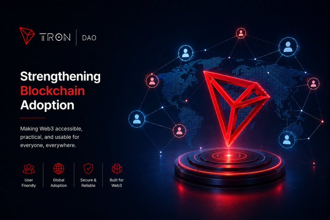 A promotional graphic for TRON DAO titled 'Strengthening Blockchain Adoption' featuring the glowing red TRON logo on a pedestal with a world map network background.