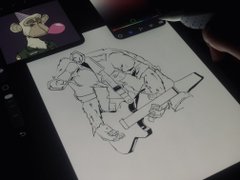 A hand-drawn sketch of a figure is visible on a digital drawing tablet screen.