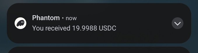 A notification from 'Phantom' reading 'You received 19.9988 USDC.'