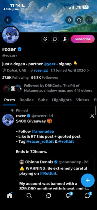 A Twitter/X profile screenshot of 'rozer' (@rozerr) showing a pinned $400 giveaway post requiring users to follow @anonadep, like and retweet, and tag @razer_rollbit & @rollbit, with a warning about scams on Rollbit.