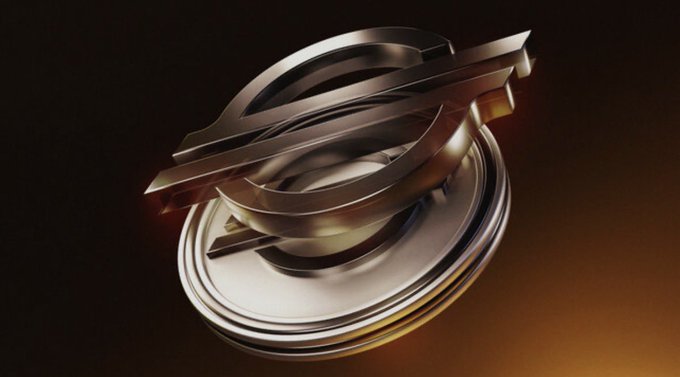 A 3D rendered metallic logo featuring sleek, swirling silver and gold ribbons or bands is displayed against a dark gradient background.