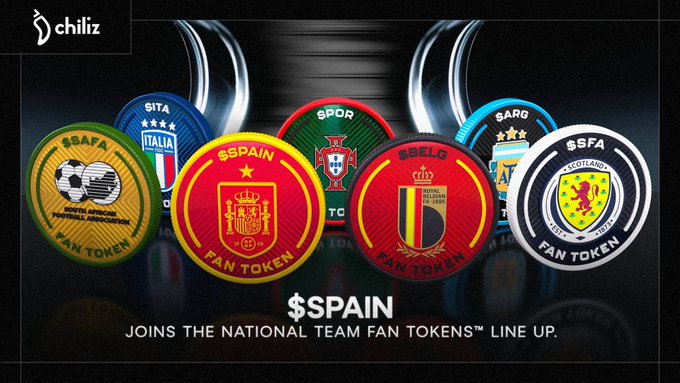 The image features a collection of six soccer team fan tokens, each with different colors and designs representing various teams from around the world. The text "Let's take a look at the National Team Fan Tokens" suggests that these tokens are being promoted or showcased in some way. The tokens are arranged in two rows on either side of the image, creating an organized display for viewers to appreciate their design and purpose.
