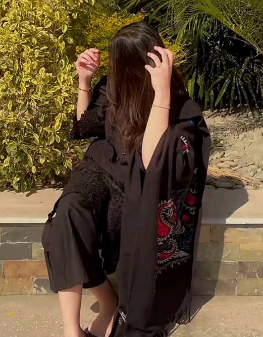 The image features a woman sitting down with her hair pulled back into a ponytail while wearing a black outfit. She appears to be posing for a photo or video, possibly for an online platform like Instagram. The background of the image includes a brick wall and some plants, creating a casual and relaxed atmosphere. The caption "Good afternoon web3 Small efforts today can bring big results tomorrow" suggests that the woman's actions in the image could symbolize the idea that consistent effort and dedication to personal growth or learning can lead to significant achievements over time.
