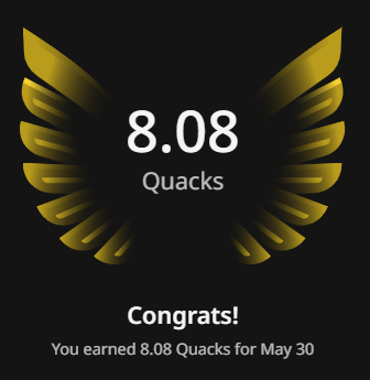 The image features an award for Quacks, with a gold bird's wing design at the top of the frame. Below the wing, there are two lines of text that read "Congratulations! You earned 8.08 Quacks for May 30". The text is written in white and yellow colors, which stands out against the black background of the image.
