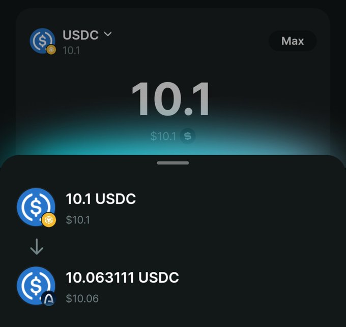 A digital wallet screen showing a USDC balance of 10.1, with a transaction converting 10.1 USDC to 10.063111 USDC.