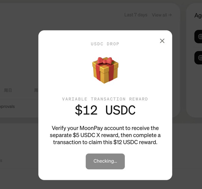 A USDC DROP pop-up notification from MoonPay offering a $12 USDC variable transaction reward with a 'Checking...' button, accompanied by a gift box emoji.