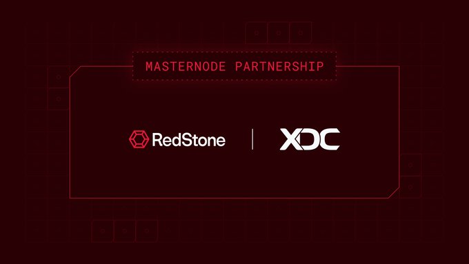 The image features a promotional poster for RedStone and XDC Network. The poster displays the logos of both companies side by side against a red background. The text at the bottom of the poster reads "Redstone is joining @XDCNetwork as an institutional masternode validator." Additionally, there are two smaller texts below the main logo: "Together with @CredoraNetwork we will operate masternodes on the XDC Network" and "with data infrastructure support to follow."