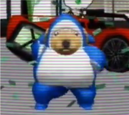 A low-resolution image showing a person in a blue and white inflatable shark costume standing in front of a red sports car.