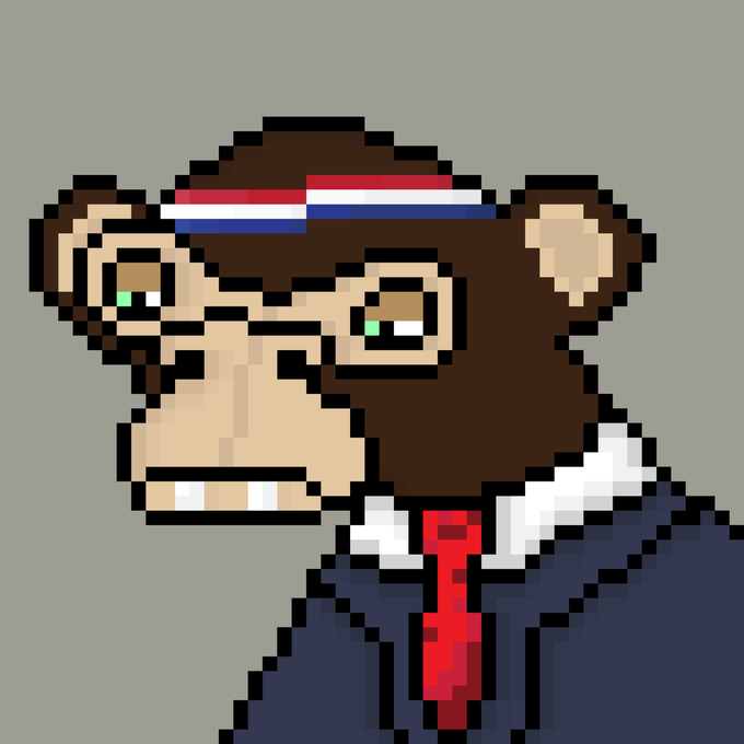 A pixel art illustration of a sad-looking monkey wearing a red, white, and blue striped headband, a dark suit, white shirt, and red tie.