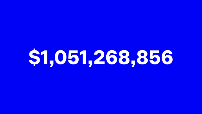 A bold white monetary figure, “$1,051,268,856,” displayed on a bright blue background.