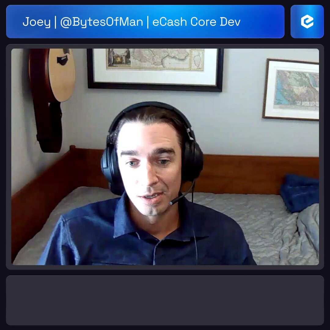 The image shows a man wearing headphones sitting at a desk with a computer monitor in front of him. The man appears to be engaged in an online meeting or video call, possibly discussing the complexities of eCash Core development. The caption above the image reads "Most crypto projects optimize for complexity. eCash $XEC optimizes for usability, scalability, and economic freedom." This suggests that the man might be talking about how eCash Core is designed to address these challenges in a cryptocurrency project.