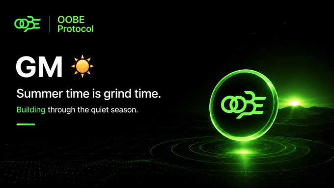 A dark graphic featuring the OOBE Protocol logo in glowing green, with the text "OOBE Protocol," "GM ☀️," and the tagline "Summer time is grind time. Building through the quiet season" displayed alongside a luminescent green orb on a dark, grid-patterned background. The image visually reinforces the post's message of using the slower summer period to focus on meaningful work and building, with the glowing orb symbolizing energy, progress, and forward momentum for OOBE Protocol.