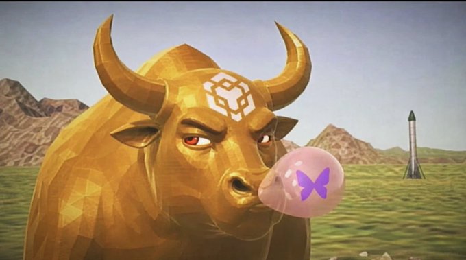 A golden bull statue with a logo on its forehead blows a pink bubblegum bubble in a rocky landscape with a rocket launching in the background, symbolizing bullish market momentum and optimism. The post's address ending in "BEEA" cleverly ties into the bull imagery, reinforcing the positive market sentiment.