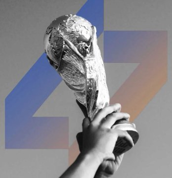 The image is a black and white photograph showing someone holding up a soccer trophy, possibly from the World Cup tournament. The background features an abstract line drawing, likely representing an upward-pointing arrow or logo that could be associated with the FIFA World Cup trading competition. The caption at the bottom of the photo reads "CHAINLINK TO ENABLE MYRIAD $100K FIFA WORLD CUP TRADING COMPETITION @MyriadMarkets". This suggests that the trophy is a part of a worldwide competition where real-time data and sports insights are essential to make informed trading decisions.