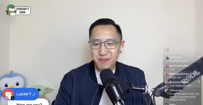 A man with glasses and an earpiece sits in front of a microphone during the 'Chinsanity Show' livestream, with a chat overlay showing usernames like 'Chinsanity' and 'LakINFT'.