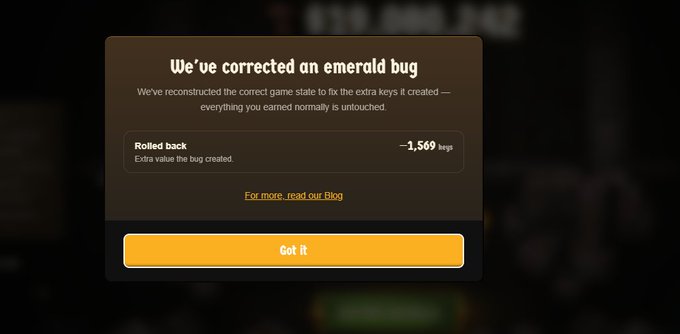 A pop-up message titled "We've corrected an emerald bug" appears on screen, explaining that extra value the bug created has been rolled back by –1,569 keg tokens, addressing concerns from a PlayCambria user who reported losing approximately $150 worth of keys during gameplay.